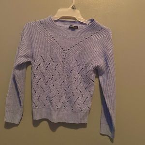Nice, simple blue sweater. Fairly lightweight. Size medium. No damage.